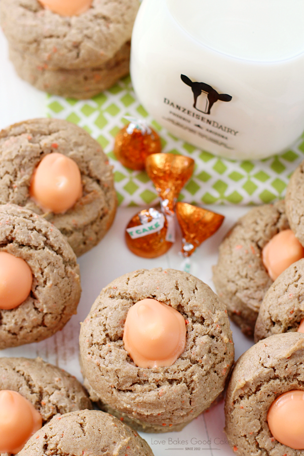 Carrot Cake Blossom Cookies with a bottle of milk.