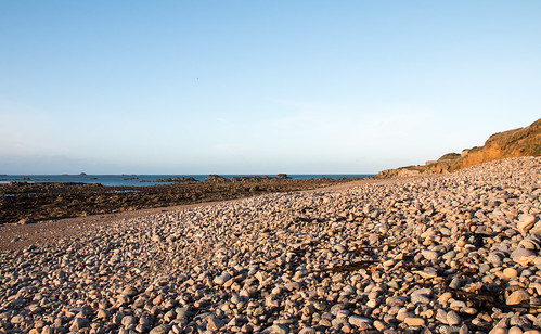 uk sunset sky seascape beach water canon coast outdoor stones shoreline pebbles coastal shore alderney channelislands clonque canon70d