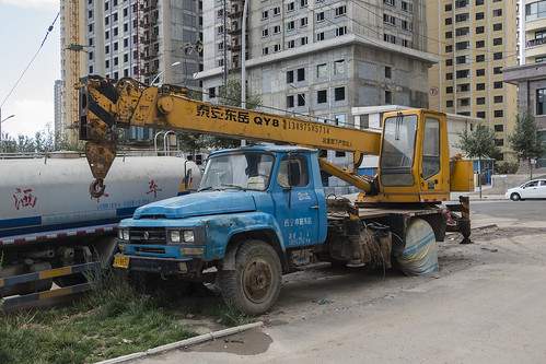 china street urban building cars truck construction asia industrial crane qinghai xining chn sonyrx100iii