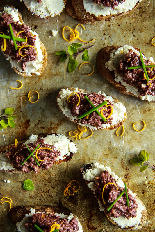 Crostini with Almond Ricotta and Spicy Olive Tapenade- Vegan and GF from HeatherChristo.com