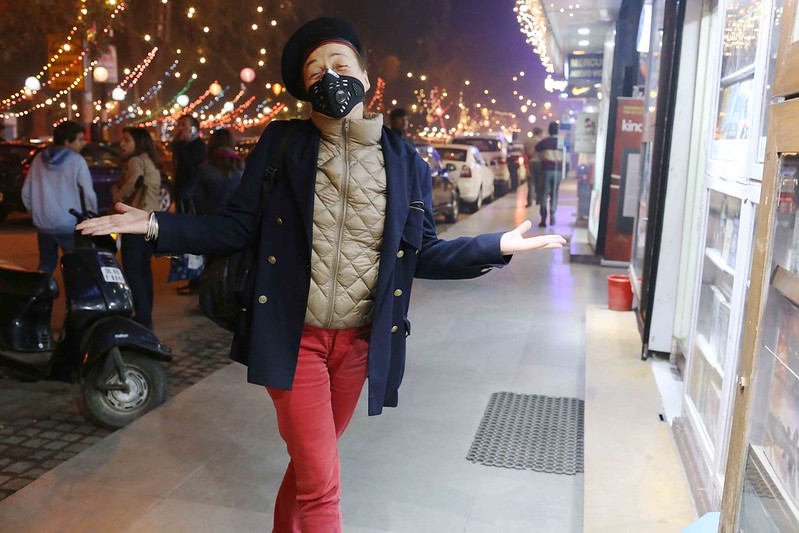 City Moment - The Woman in the Anti-Pollution Mask, Khan Market