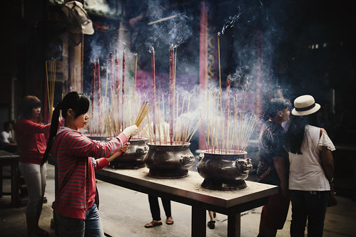 travel people asia southeastasia dof smoke religion vietnam traveling spiritual saigon hochiminhcity hcmc sprit travelphotography incensesticks sigma35mm canon6d desomnis