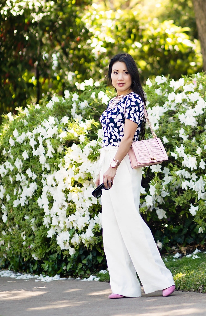 cute & little blog | petite fashion | chelsea28 wide leg white pants, floral crop top, minkoff pink love crossbody, pearl necklace | spring outfit