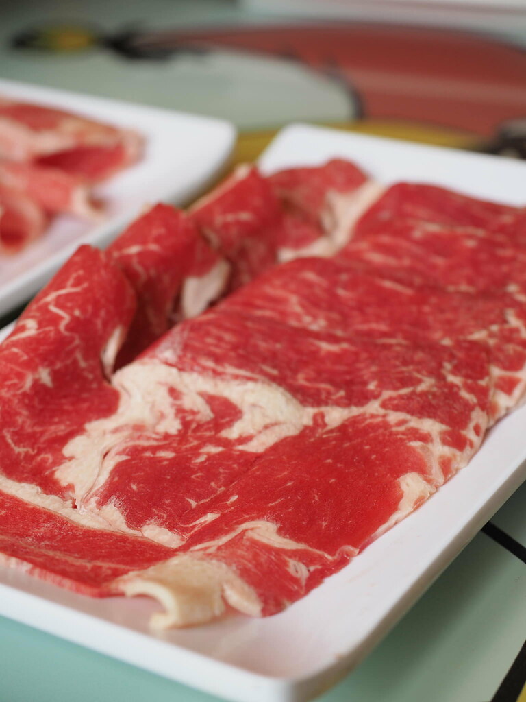 Slices of fresh pork at Good Bar Steamboat at Taichung, Taiwan