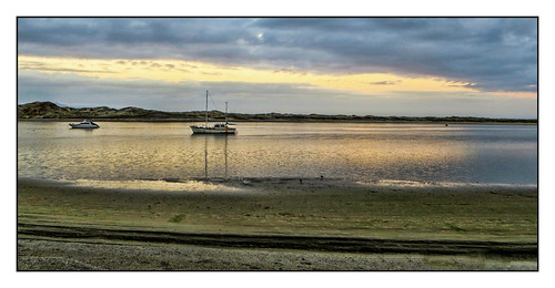 water boats estuary evening calm serene