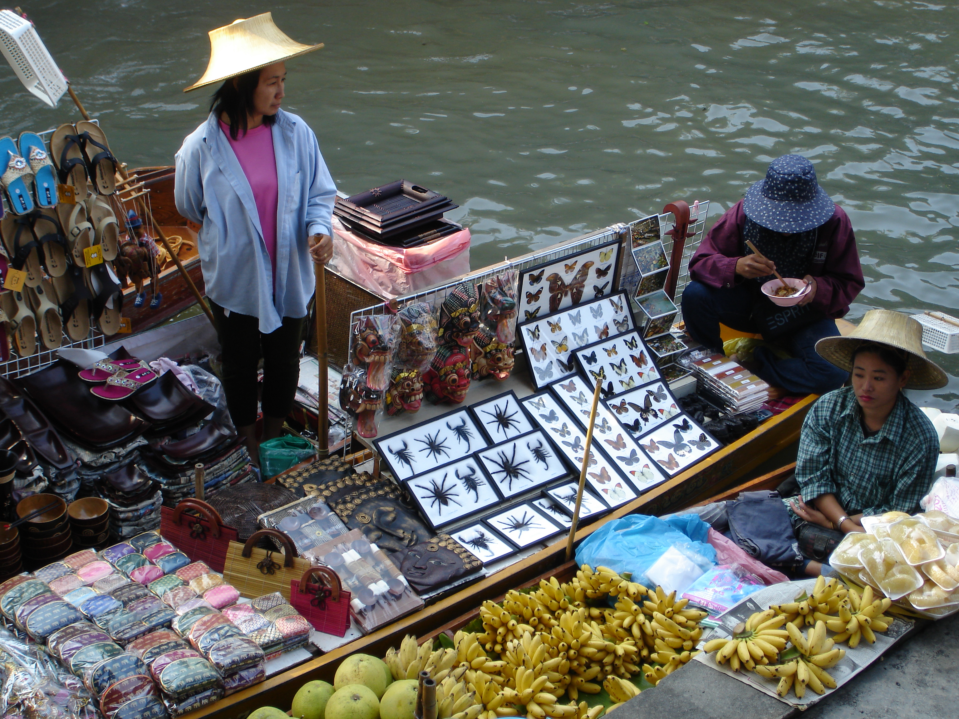 Just about everything you can find in a regular land-based village market in Thailand, you can find at the Damnoen Saduak Floating Market at higher prices but better ambiance. Photo taken by Mark Joseph Jochim on January 10, 2006.