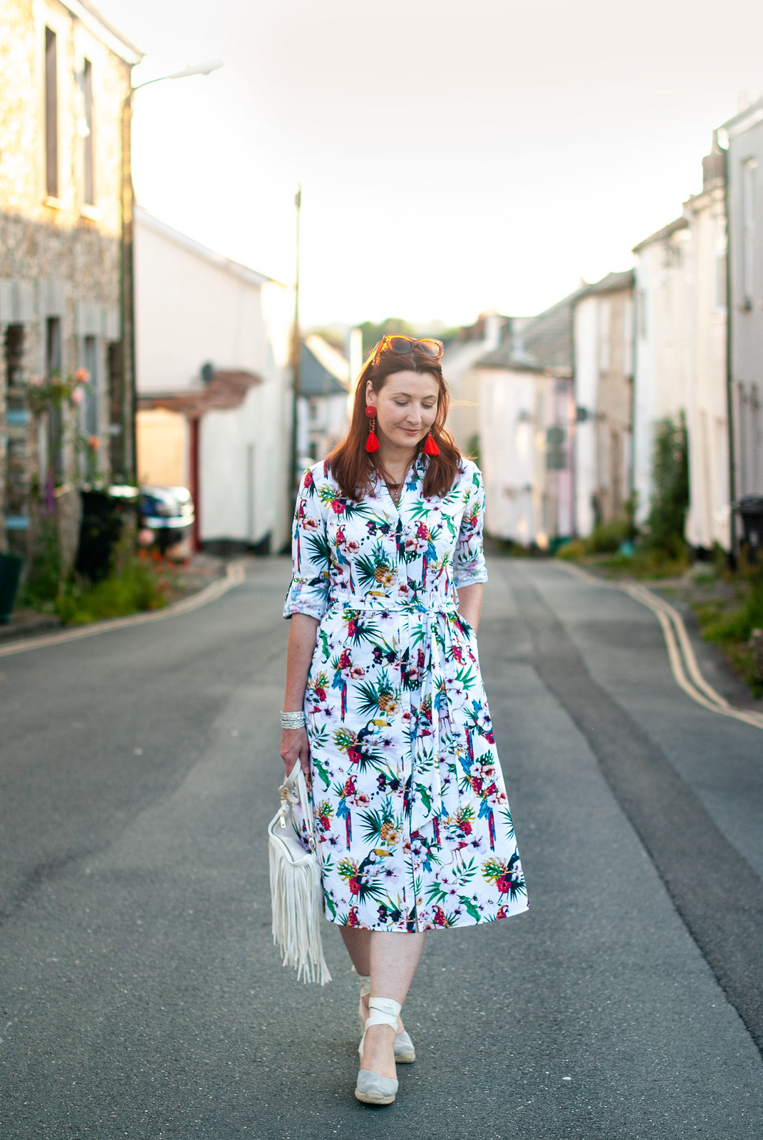 Florals With a Twist | A Loud Birds & Tropical Print \ tropical print midi shirt dress \ grey lace-up espadrilles \ red tassel earrings \ white fringed crossbody bag | Not Dressed As Lamb, over 40 style