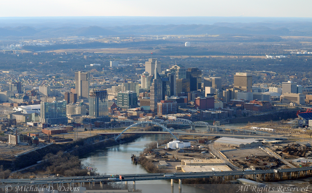 Aerial view of downtown Nashville, Tennessee, with the Cumberland River in the foreground, as seen in 2009.