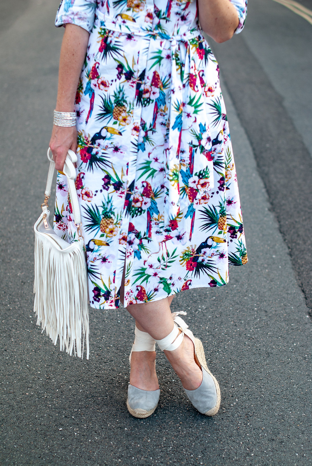 Florals With a Twist | A Loud Birds & Tropical Print \ tropical print midi shirt dress \ grey lace-up espadrilles \ red tassel earrings \ white fringed crossbody bag | Not Dressed As Lamb, over 40 style