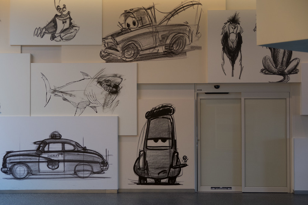 Sketches and drawings on wall at Art of Animation
