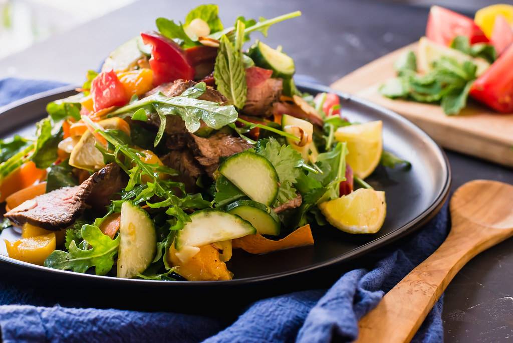 Thai Steak Salad Full of Layers of Flavor and Tossed with a Sweet and Sour Chile Vinaigrette, Fresh Mango and Bright Herbs, Such as Basil and Mint.