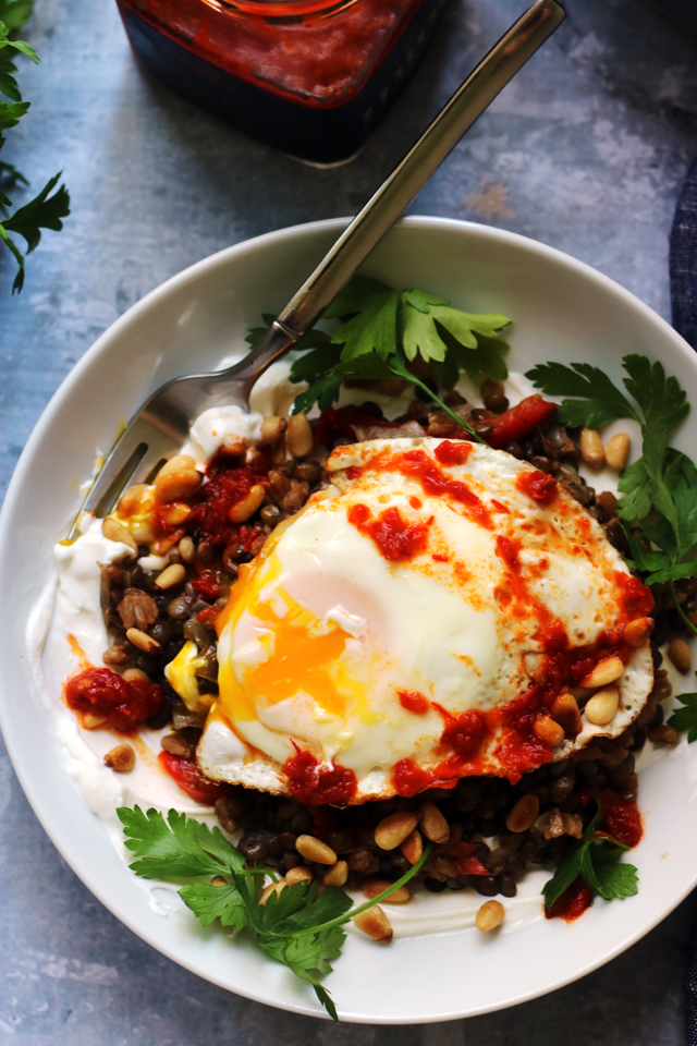 Farro and Lentil Mujaddara with Harissa, Toasted Pine Nuts, and a Fried Egg