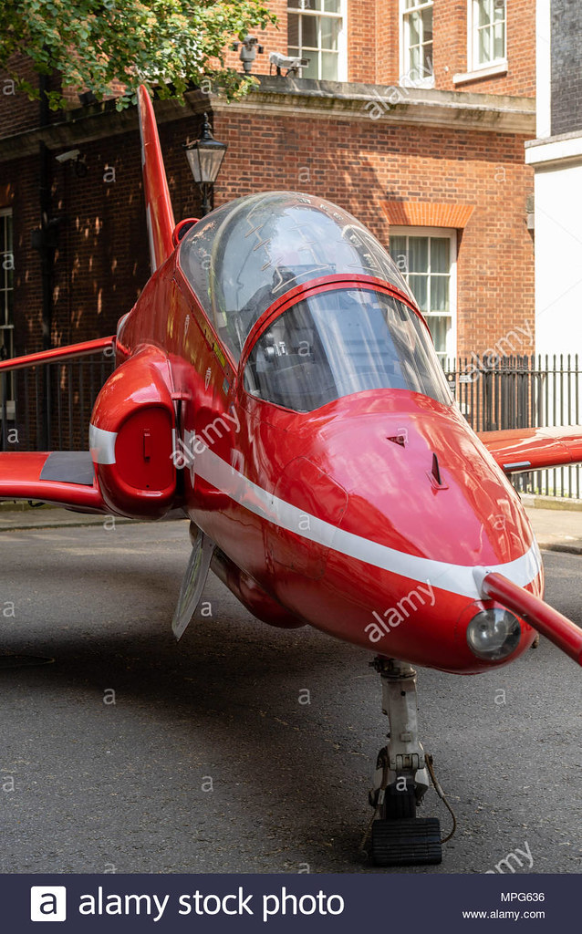 london-uk-23rd-may-2018-a-hawker-siddeley-hawk-red-arrow-aircraft-in-downing-street-for-the-anniversary-of-the-founding-of-the-r