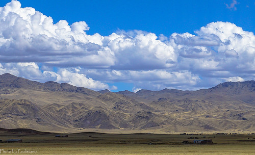 travel peru andes sky altiplano mountains cloud landscape grass nature