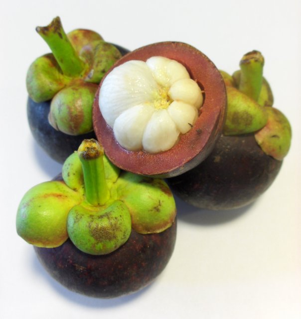 Only the white flesh of the purple mangosteen is edible. Photo taken on July 2, 2006.