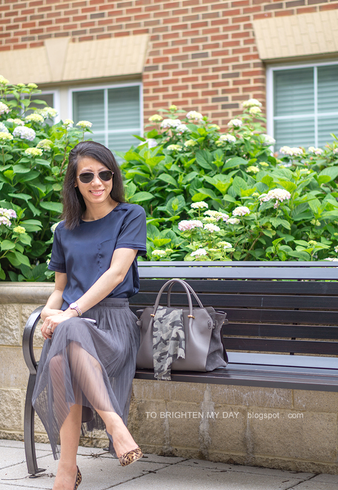 navy silky top, two-tone watch, dark gray tulle midi skirt, camo printed scarf, gray suede tote, leopard pumps