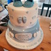 Two tiered baby blue booties naming/christening cake