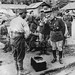 Basarabia, ROMÂNIA (iulie 1941). Generalul Ion Antonescu șeful Statului Român în inspecție pe frontul din Basarabia, gustă din mâncarea soldaților.