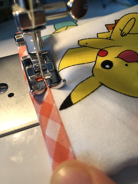 Sewing a tooth fairy pillow with Pokémon fabric. This 20-minute project has high impact with bold fabric or bias tape. Read more on EvinOK.com