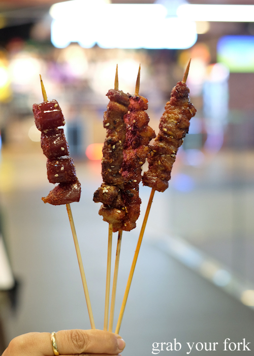 Cantonese sausage; spice pepper with cumin lamb; pickled pepper beef brisket; and spicy bulgogi pork belly skewers at Granny Wolf BBQ in Central Park Mall Sydney