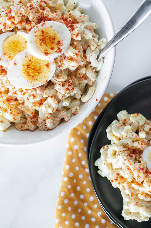 This Deviled Egg Macaroni Salad is perfect for all your summer gatherings. It’s creamy, loaded with hard-boiled eggs and super easy to make.