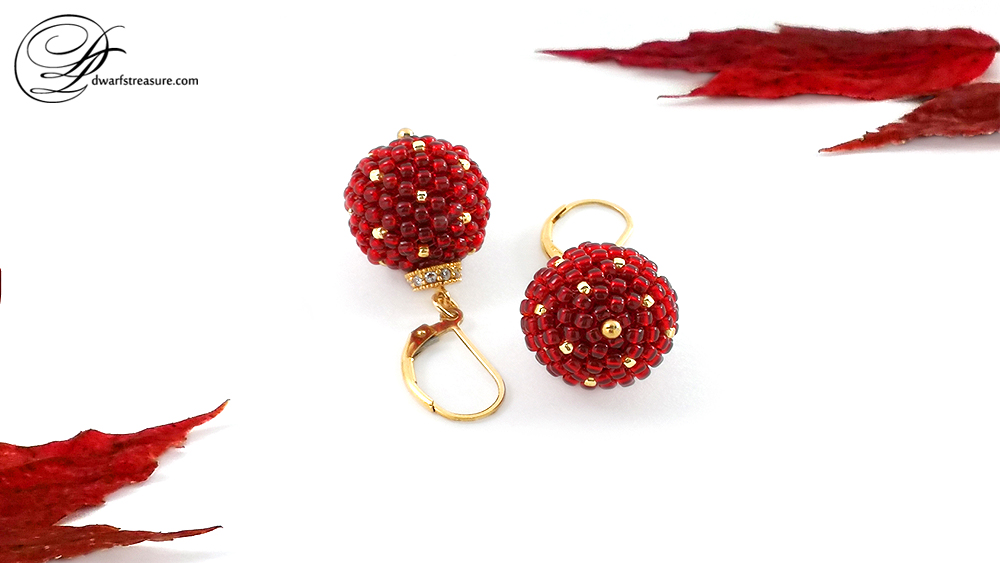 stylish red beaded bead earrings with gold sparkles 