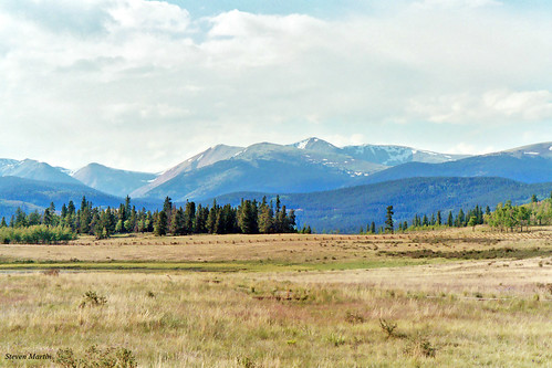 landscape scenery mountainpass mountainrange mountains meadow grassclouds colorado unitedstates