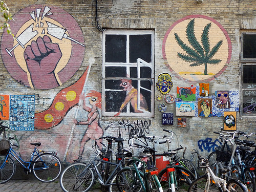 A mural in the counter-culture area of Copenhagen called Christiania. The bikes add another note.