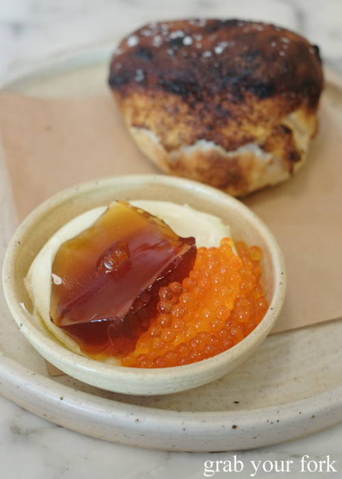 Potato bread with kefir cream, dashi jelly and trout roe at Ester in Chippendale, Sydney