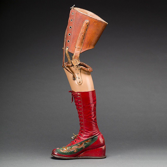 Prosthetic leg with leather boot, Appliquéd silk with embroidered Chinese motifs. Photograph Javier Hinojosa. Museo Frida Kahlo © Diego Riviera and Frida Kahlo Arc