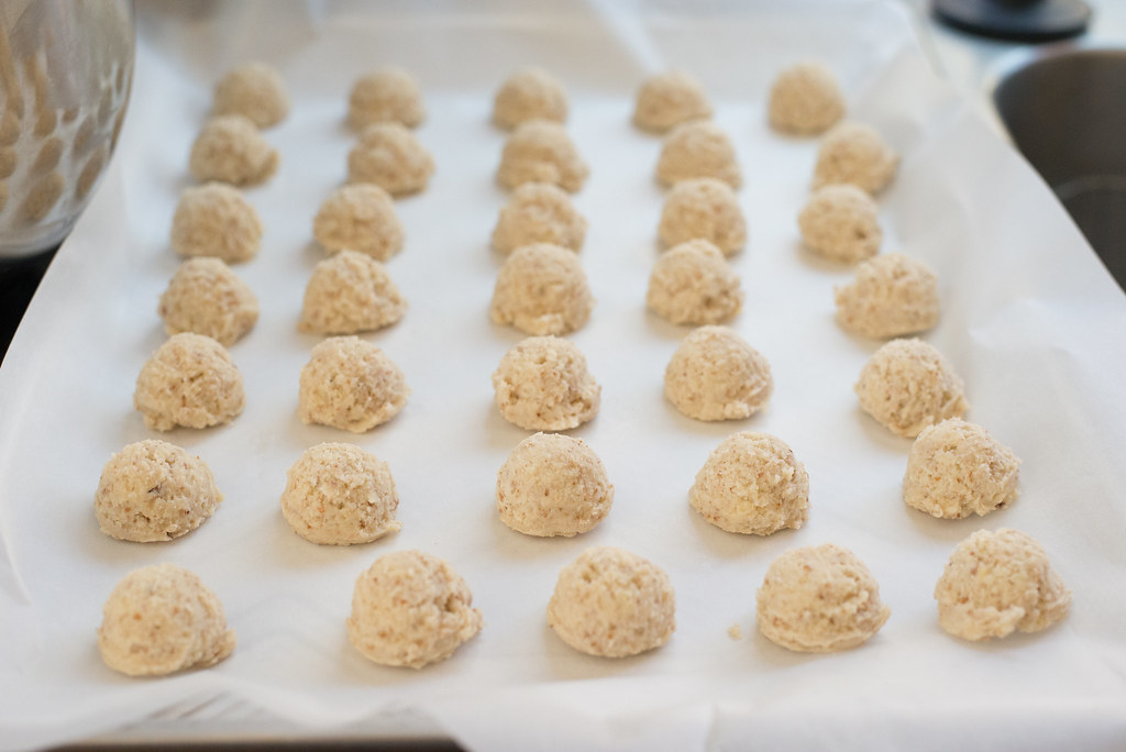 Use a melon baller or small cookie scoop to scoop and drop the batter for these easy Italian wedding cookies.