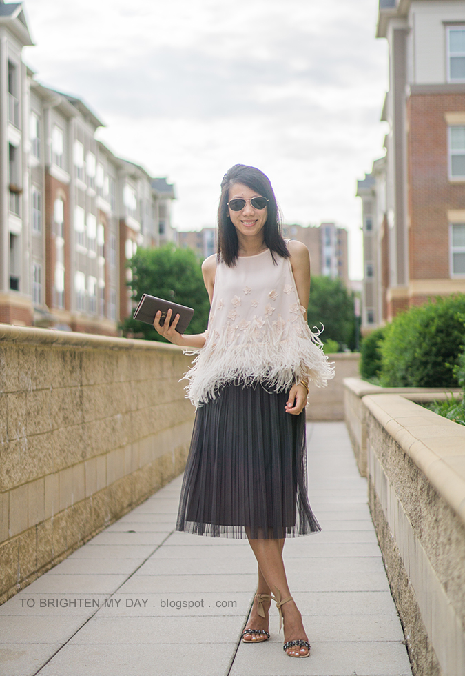 feathered fringe sleeveless top, dark gray tulle midi skirt, rose gold cuff, taupe clutch, suede jeweled sandals with ankle ties