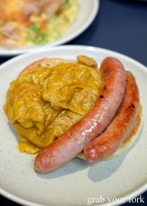 Curried scrambled eggs, LP's sausage and English muffin at A1 Canteen by Clayton Wells in Chippendale Sydney