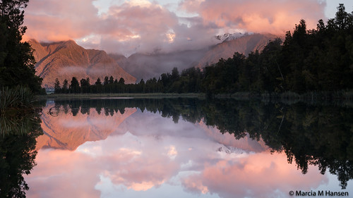 newzealand westcoast southisland lakematheson mountains sunset water lake trees