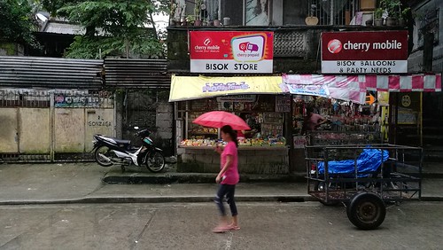 manila caloocancity store street morning wet rain color horizontal