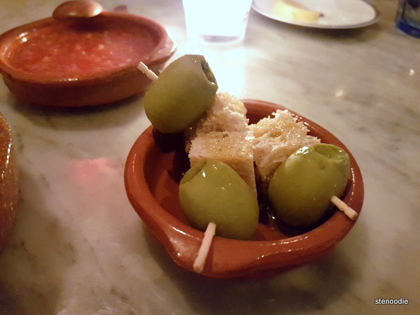  Stuffed olives and bread on a skewer