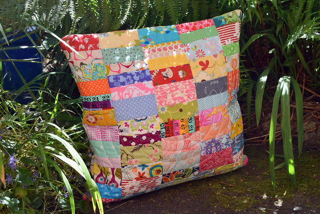 Scrappy Stacked Coins cushion