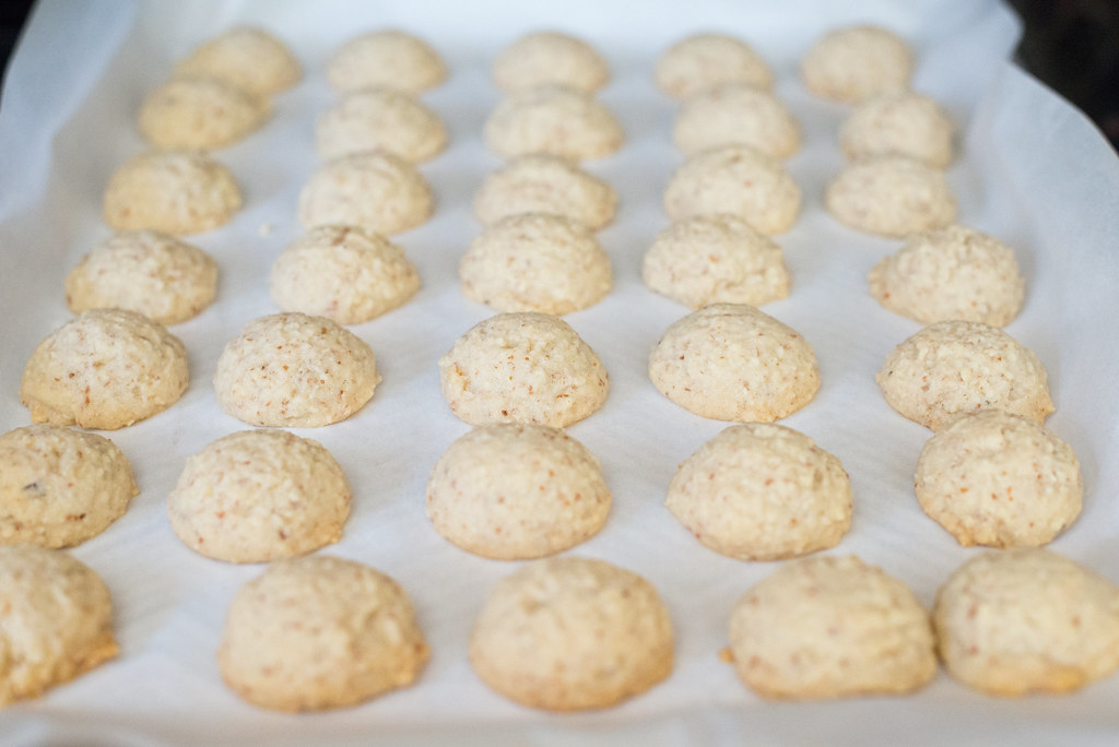 Bake Italian wedding cookies until lightly golden.