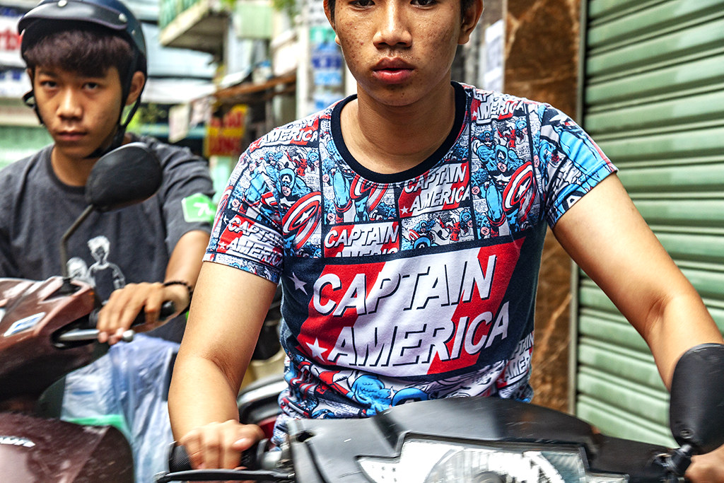 Teenager in CAPTAIN AMERICA shirt--Saigon