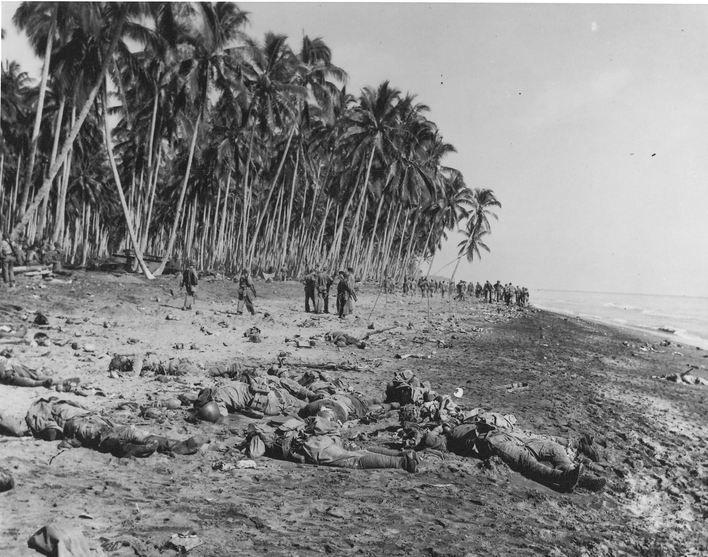 Dead Japanese soldiers lie on the sandbar at the mouth of Alligator Creek on Guadalcanal on August 21, 1942, after being killed by U.S. Marines during the Battle of the Tenaru. 