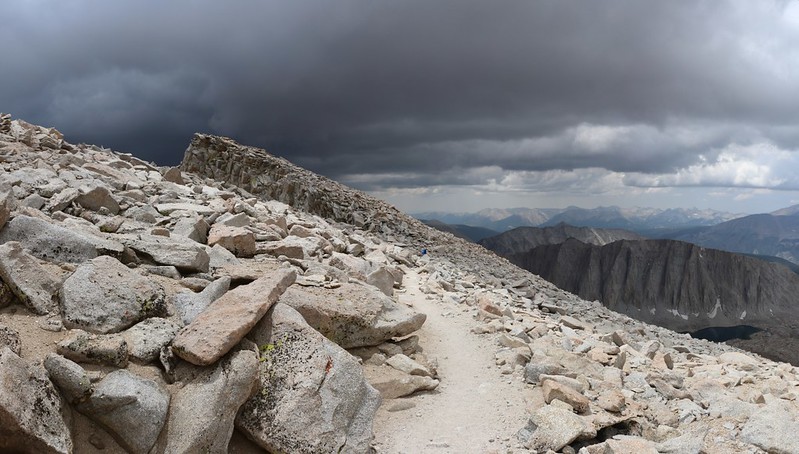 The clouds are getting seriously dark ahead of us as we descend from Mount Whitney on the JMT