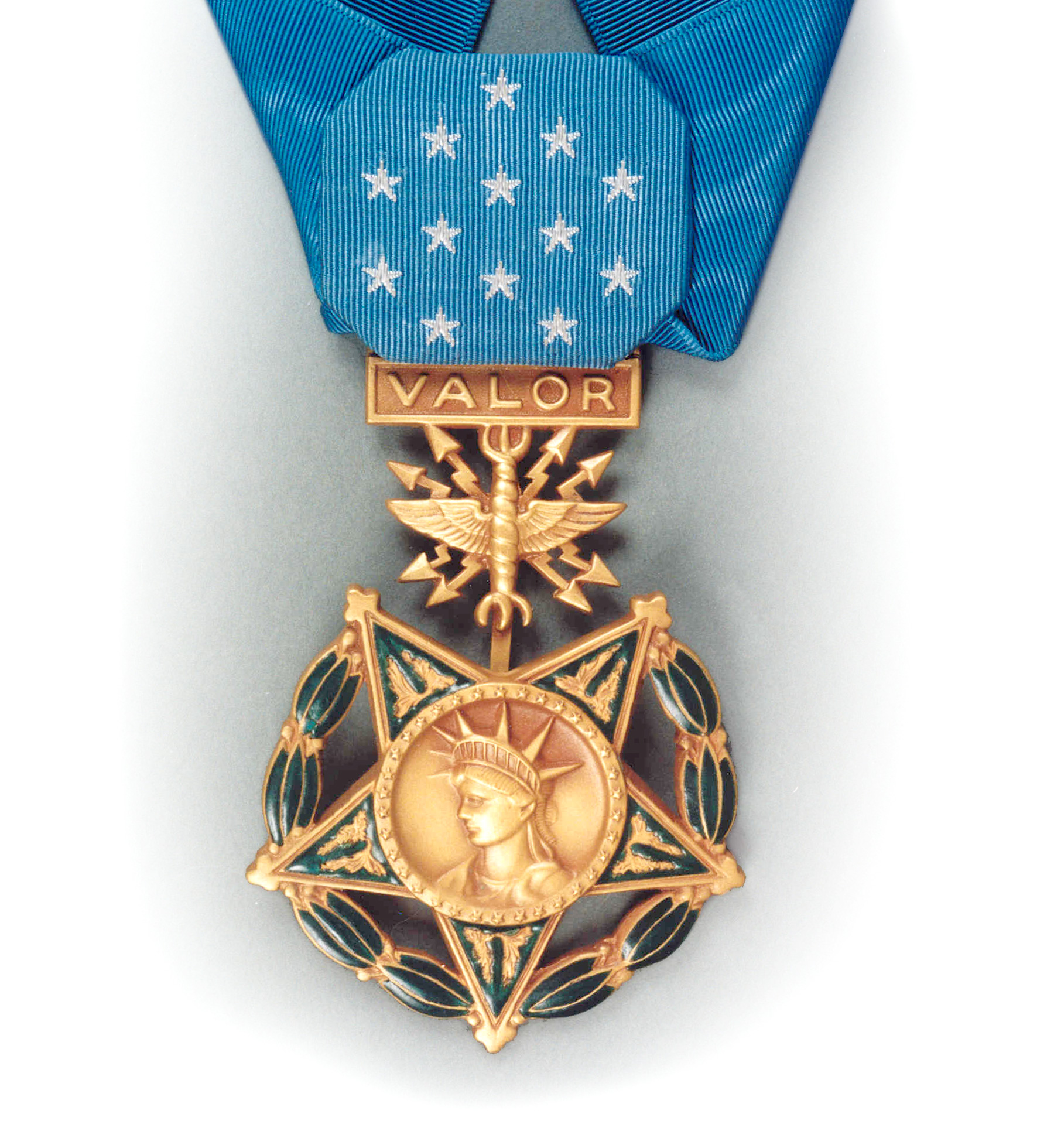 The Air Force Medal of Honor features the Statue of Liberty surrounded by a circle of 34 stars. 