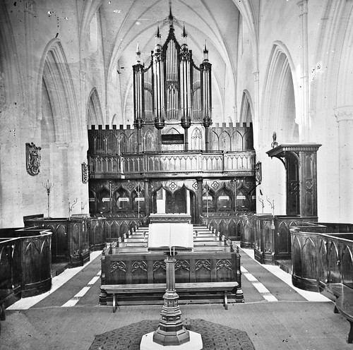 thestereopairsphotographcollection lawrencecollection stereographicnegatives jamessimonton frederickhollandmares johnfortunelawrence williammervynlawrence nationallibraryofireland gothic church interior ambo lectern seats stalls organ downcathedral downpatrick stpatrickscathedral pipeorgan cathedralchurchoftheholytrinity pulpitum pipes locationidentified probablycataloguecorrection possiblecataloguecorrection