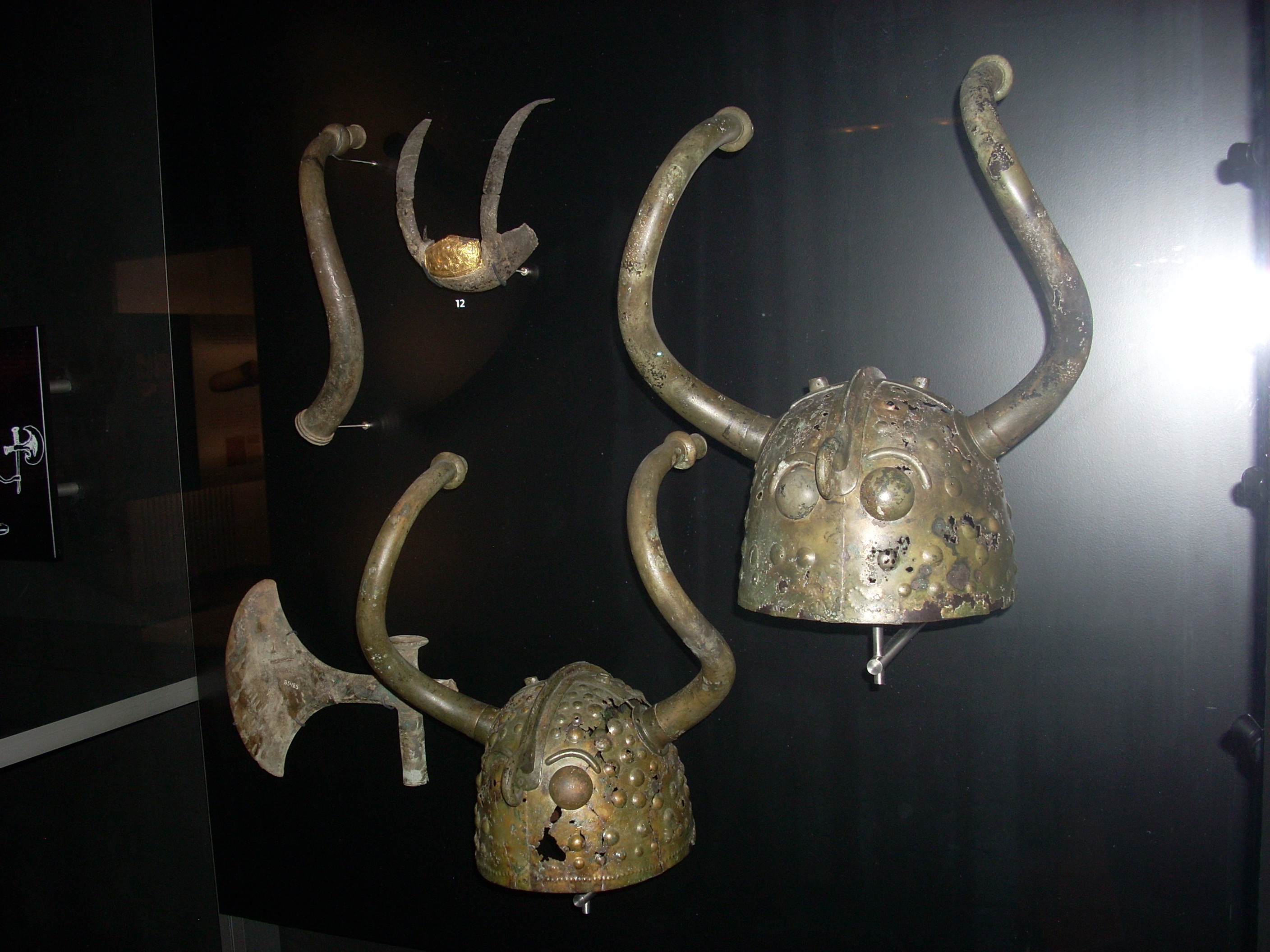 The Veksø helmets - bronze Age horned helmets from Brøns Mose at Veksø on Zealand, Denmark. Photo taken at the National Museum of Denmark, Copenhagen, on March 11, 2011.
