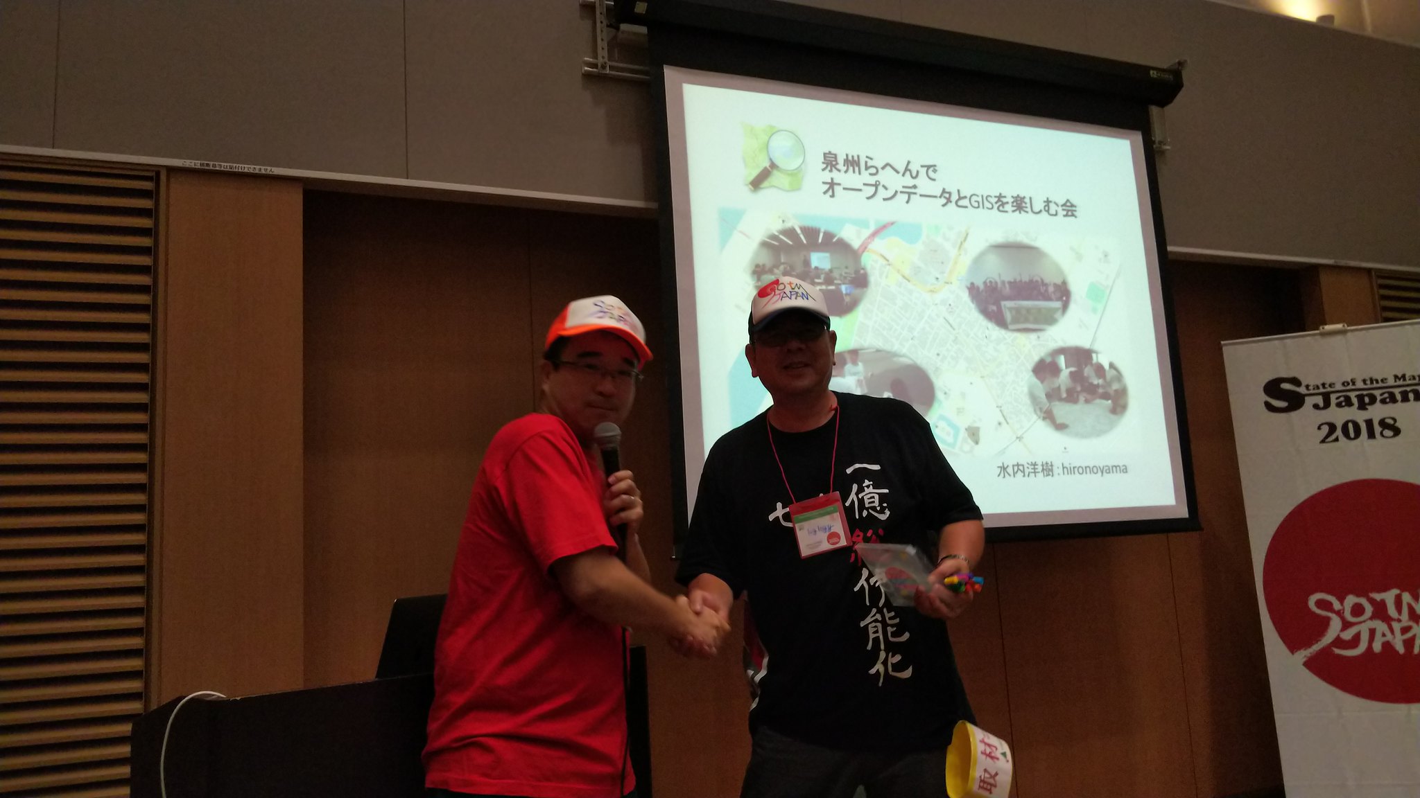 crafter(right) with winner(left) of hand drawing cap
