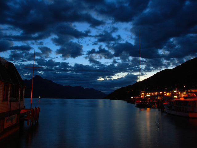 A view of Queenstown and Lake Whakatipu just after dusk