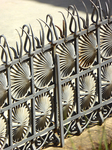 Intricate ironwork located within Park Güell showing the unique creative talent of Antoni Gaudí i Cornet