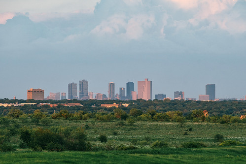 lenstagger fortworth fwtx cowtown tx texas fw downtown sunset buildings pasture green land urbanarea telephoto longlens canonfd canonfd300mmf4l 300mm sonymirrorless sony a7riii