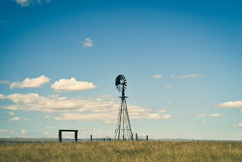 windmill montana prairie sky grass lakes basin blue yellow