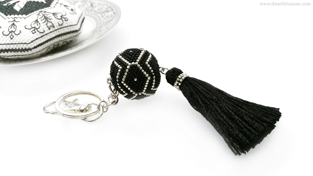 Adorable black one in a kind beaded ball charm